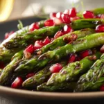 Warm Holiday Asparagus Salad with Pomegranate Seeds
